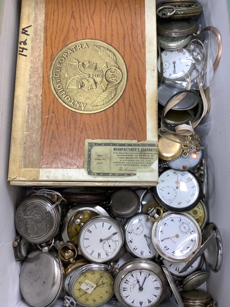 A group of assorted base metal pocket and fob watches including Longines and a quantity of accessories including movements and bezels.